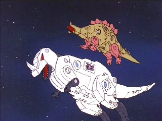 Slugfest (upper dinosaur) with Overkill — Call of the Primitives, original G1 cartoon.